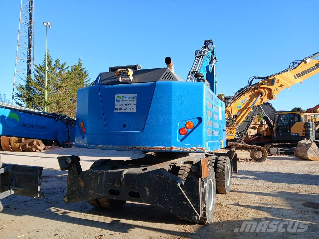 Fuchs MHL 320F Gumikerekes kotrók