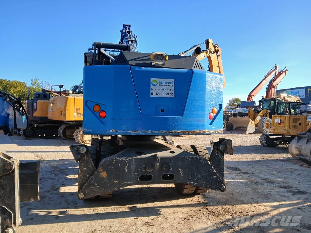 Fuchs MHL 320F Gumikerekes kotrók