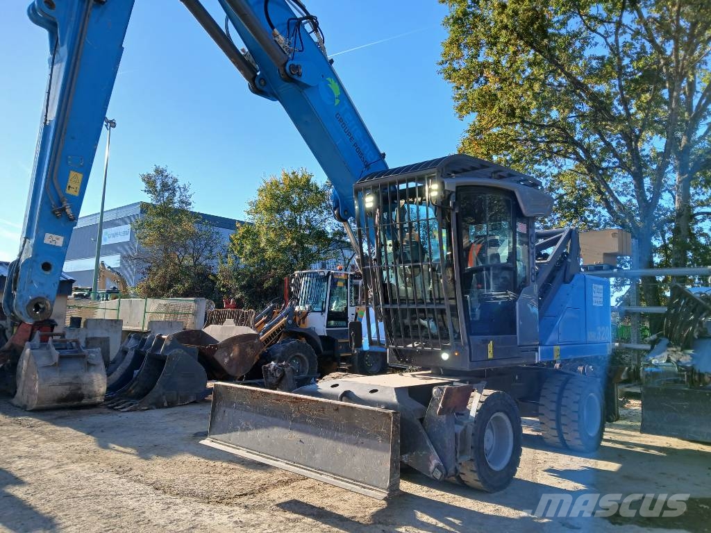 Fuchs MHL 320F Gumikerekes kotrók