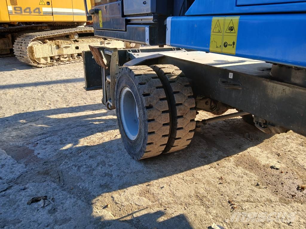 Fuchs MHL 320F Gumikerekes kotrók