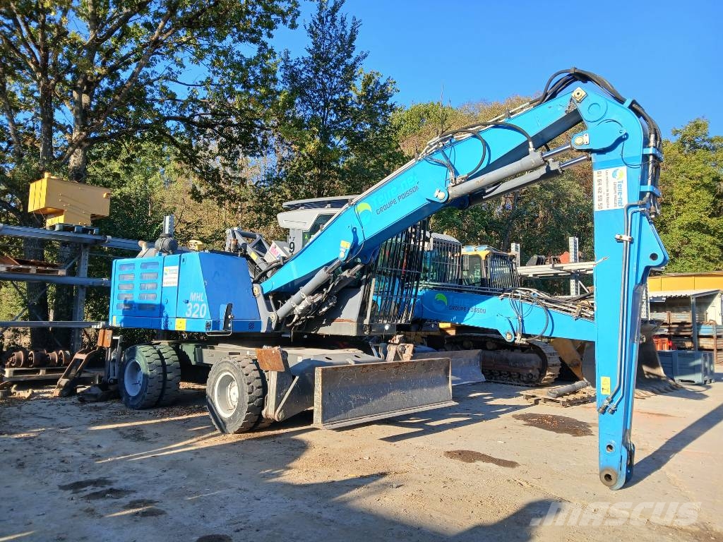 Fuchs MHL 320F Gumikerekes kotrók