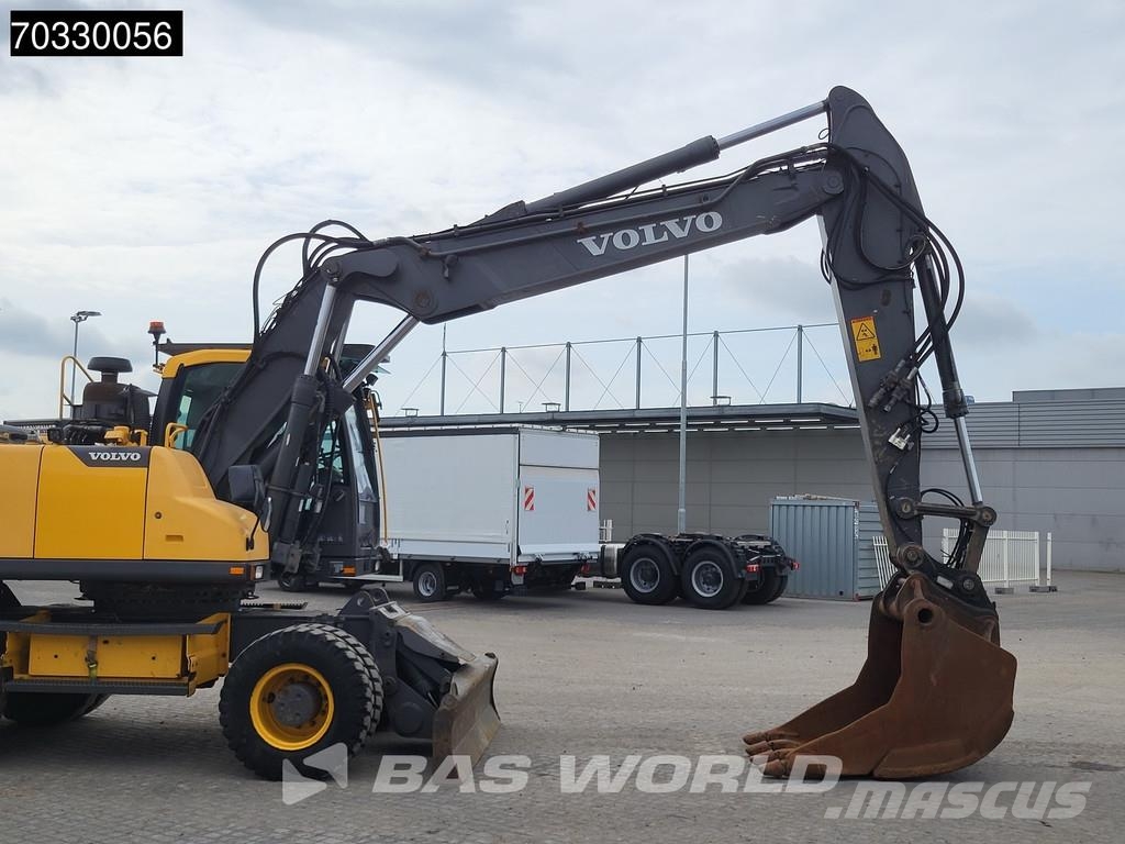 Volvo EW210 D Outrigers + Blade حفارات بعجل