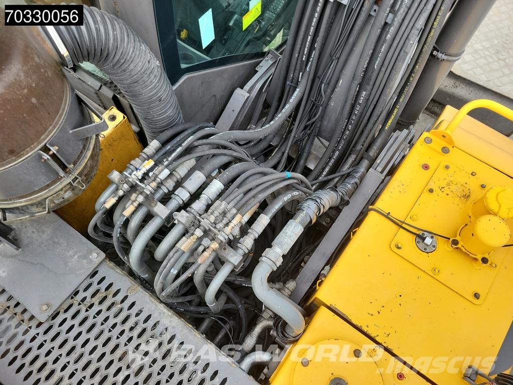 Volvo EW210 D Outrigers + Blade حفارات بعجل