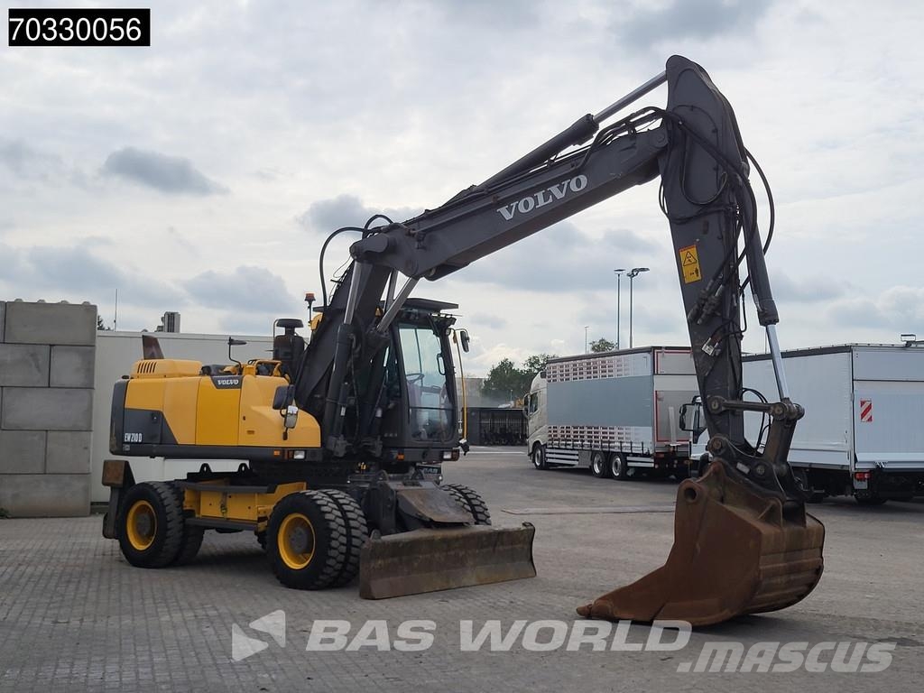 Volvo EW210 D Outrigers + Blade حفارات بعجل