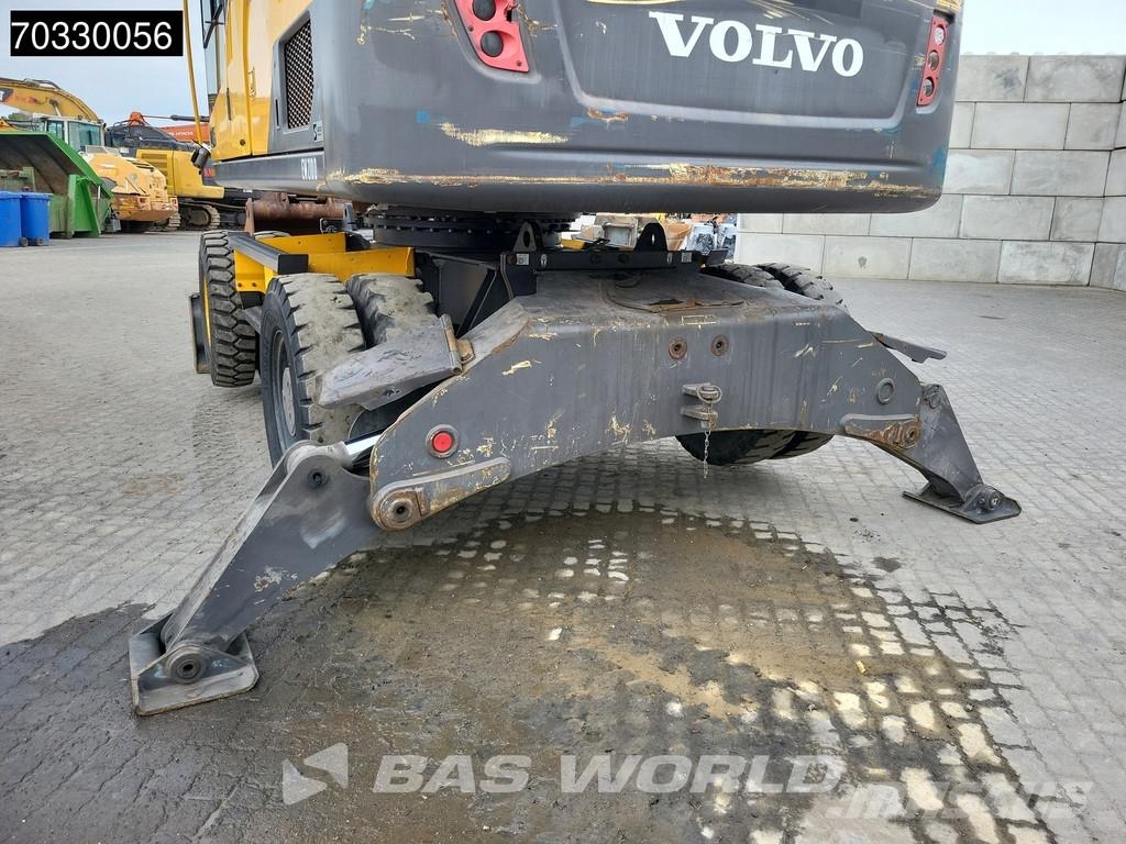 Volvo EW210 D Outrigers + Blade حفارات بعجل