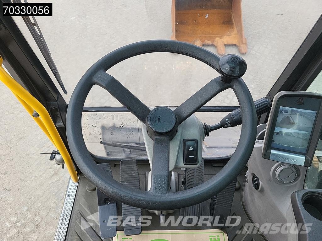 Volvo EW210 D Outrigers + Blade حفارات بعجل