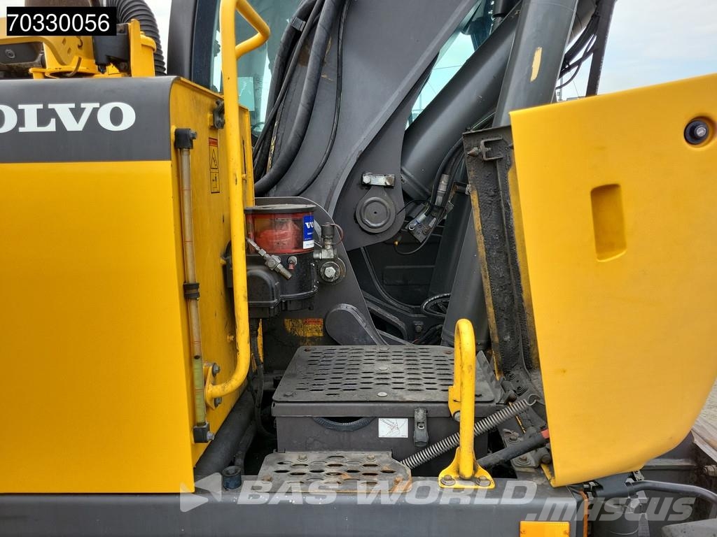 Volvo EW210 D Outrigers + Blade حفارات بعجل