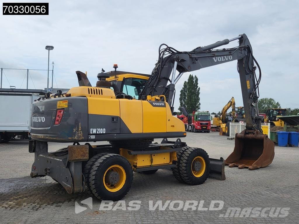 Volvo EW210 D Outrigers + Blade حفارات بعجل
