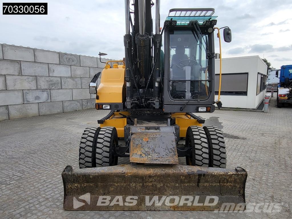 Volvo EW210 D Outrigers + Blade حفارات بعجل