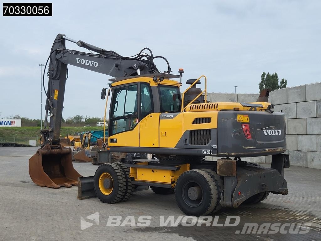 Volvo EW210 D Outrigers + Blade حفارات بعجل