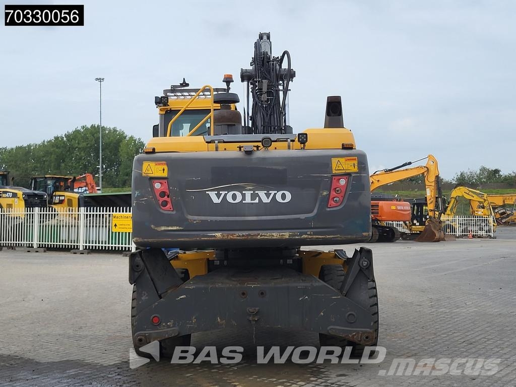 Volvo EW210 D Outrigers + Blade حفارات بعجل