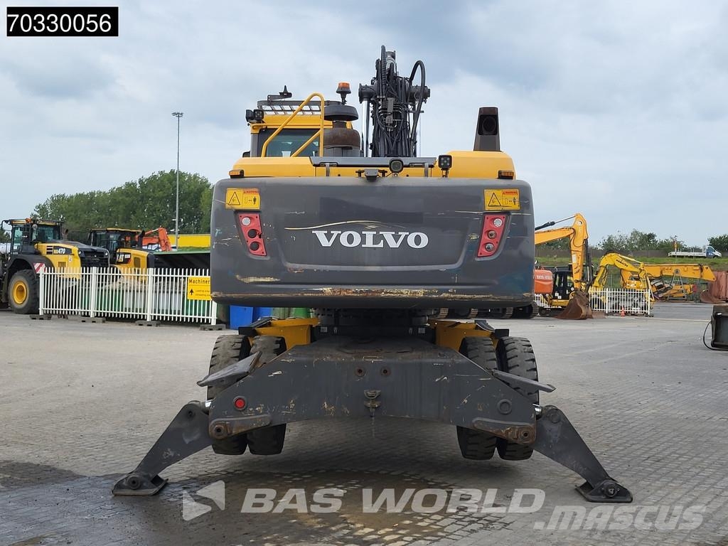 Volvo EW210 D Outrigers + Blade حفارات بعجل