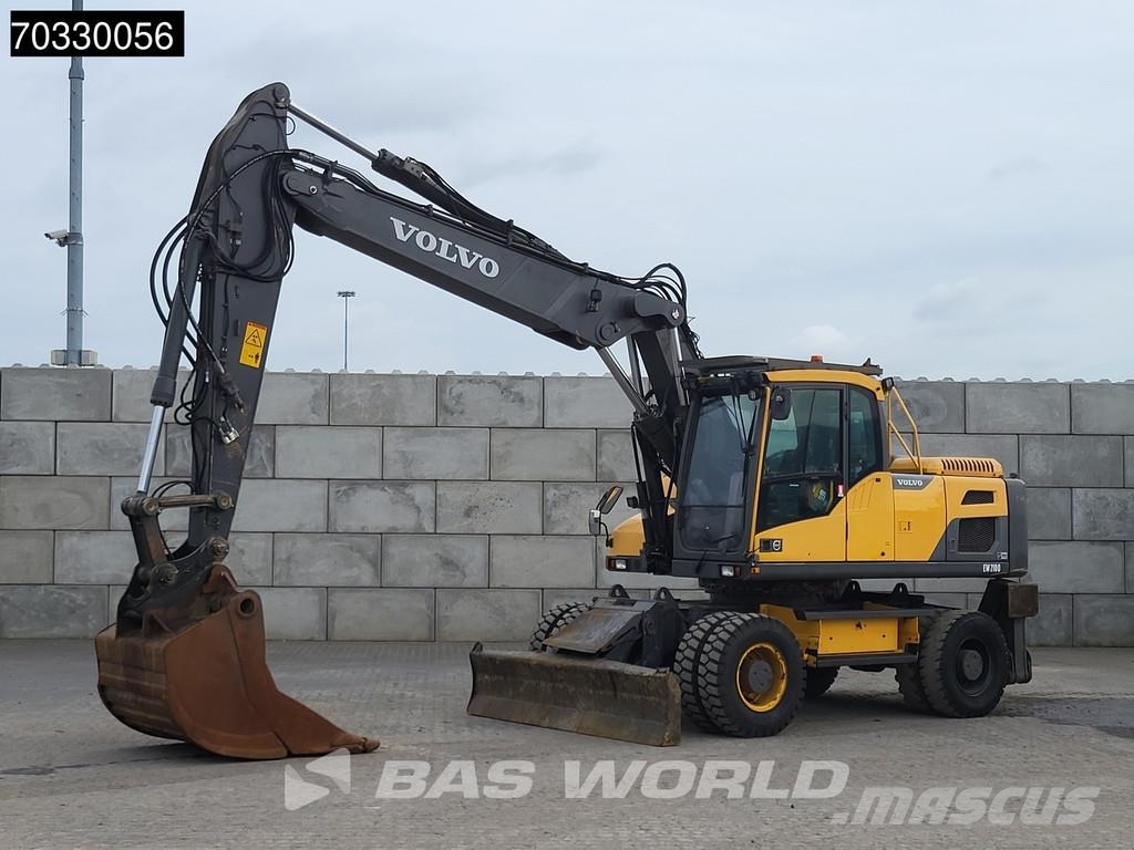 Volvo EW210 D Outrigers + Blade حفارات بعجل