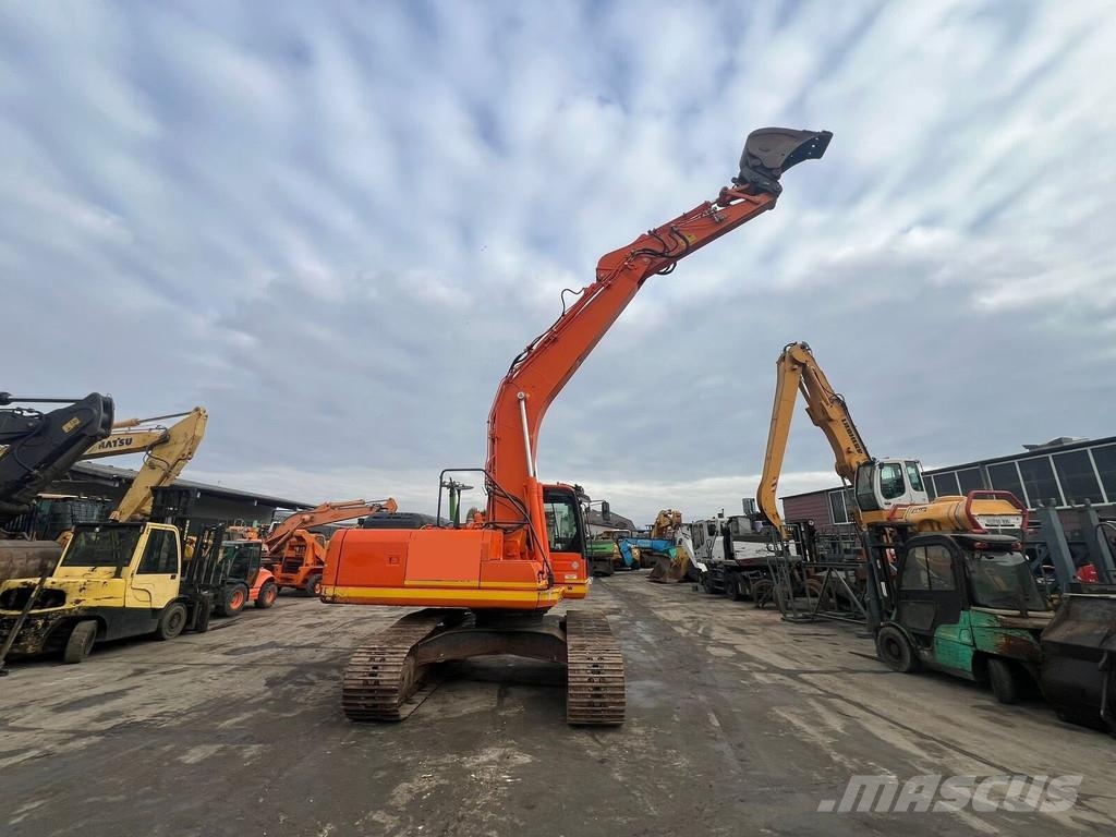 Komatsu HB 215 LC-1 حفارات زحافة