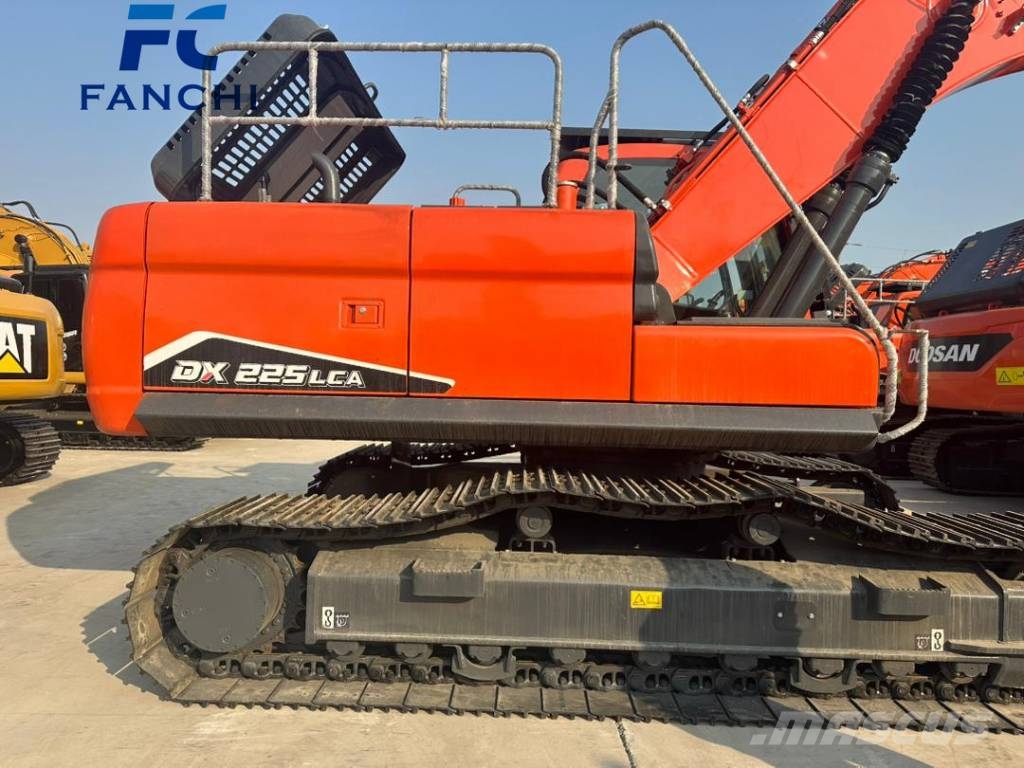 Develon DX225 LC Beltegraver