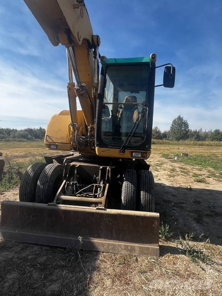 CAT CAT 318C Gumikerekes kotrók