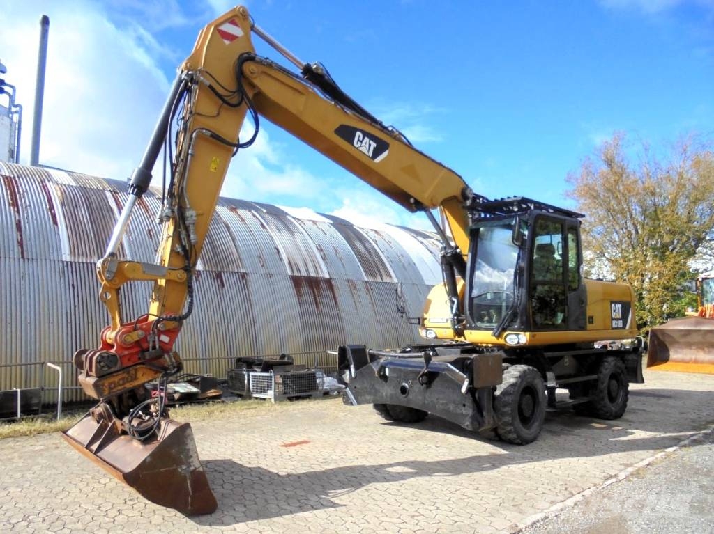 CAT M 318 D Bagri na kolesih
