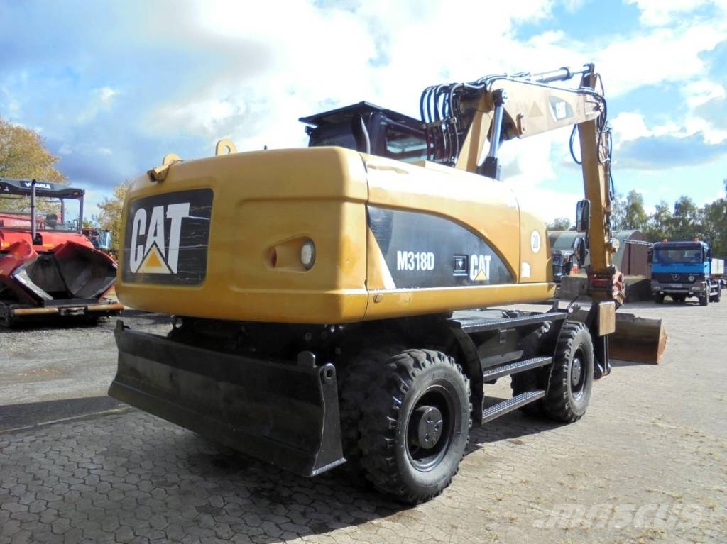 CAT M 318 D Bagri na kolesih