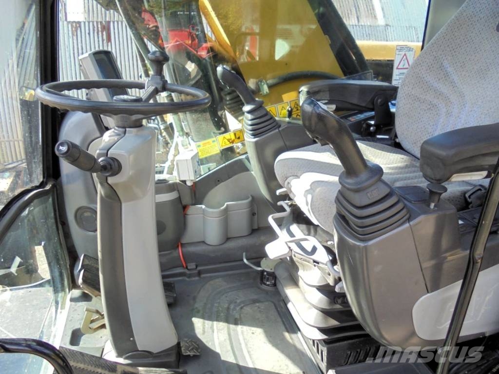 CAT M 318 D Bagri na kolesih