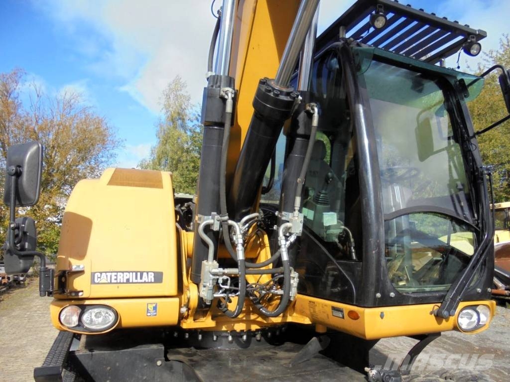 CAT M 318 D Bagri na kolesih