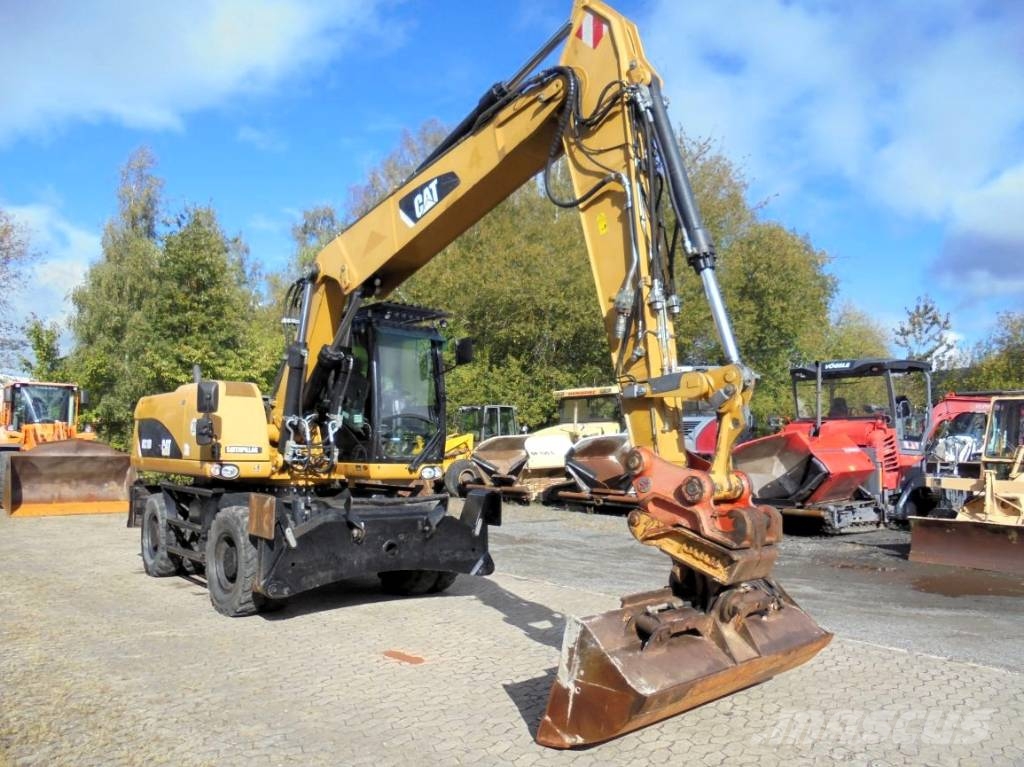 CAT M 318 D Bagri na kolesih