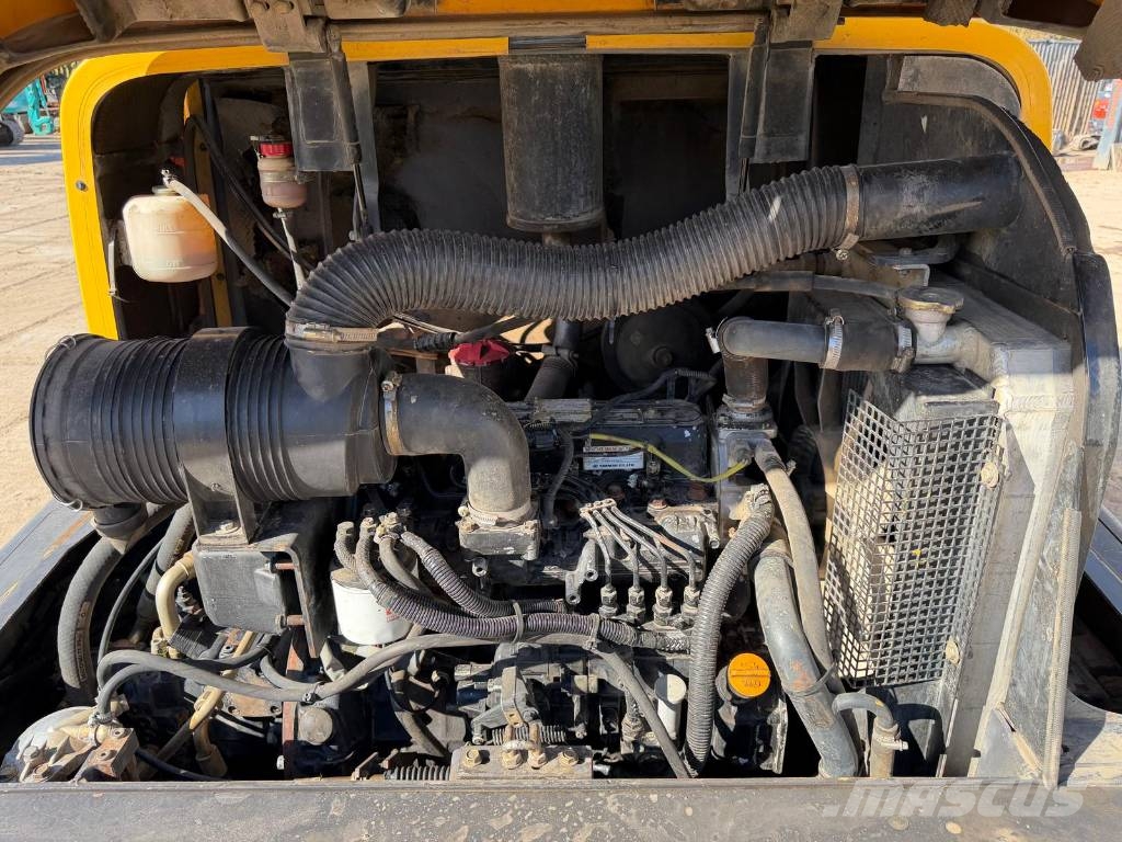 Komatsu WA 75-3 Фронтальные погрузчики