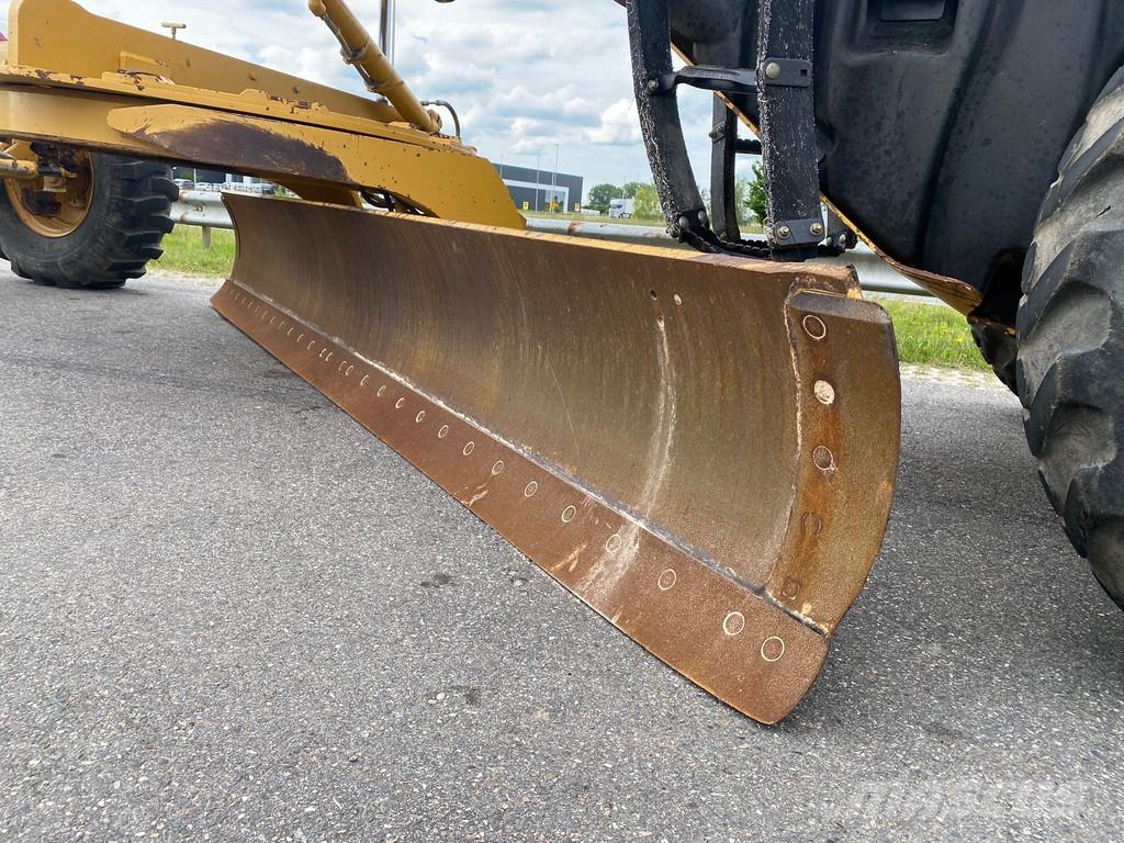 CAT 140M Ripper + Pushblock Tiehöylät