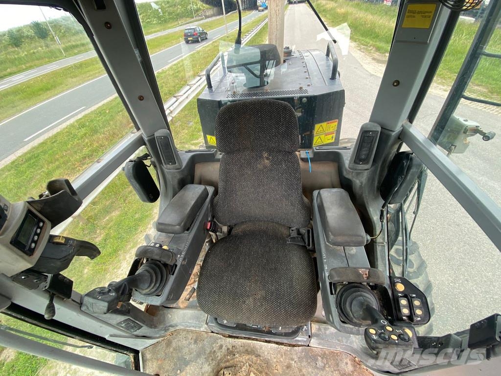 CAT 140M Ripper + Pushblock Tiehöylät