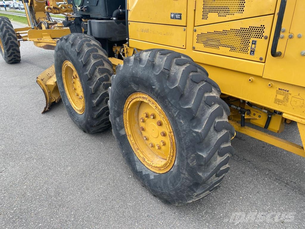 CAT 140M Ripper + Pushblock Tiehöylät