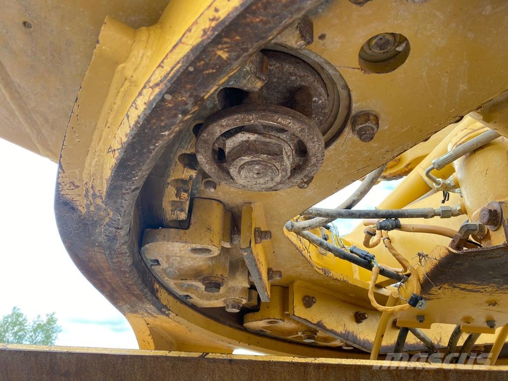 CAT 140M Ripper + Pushblock Tiehöylät