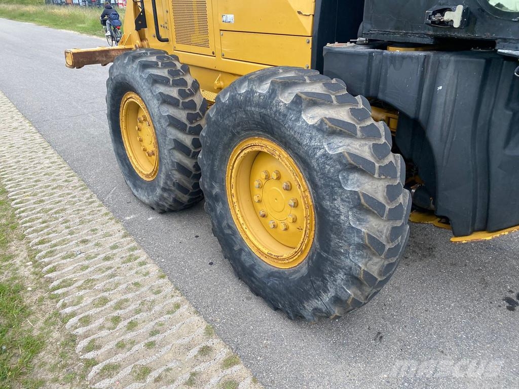 CAT 140M Ripper + Pushblock Tiehöylät