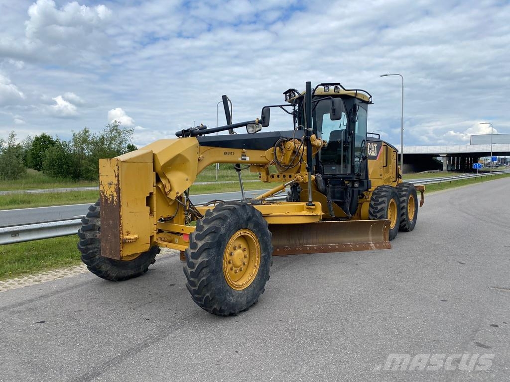 CAT 140M Ripper + Pushblock Tiehöylät