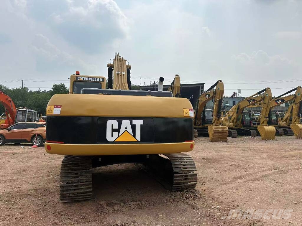 CAT 325 C Гусеничні екскаватори
