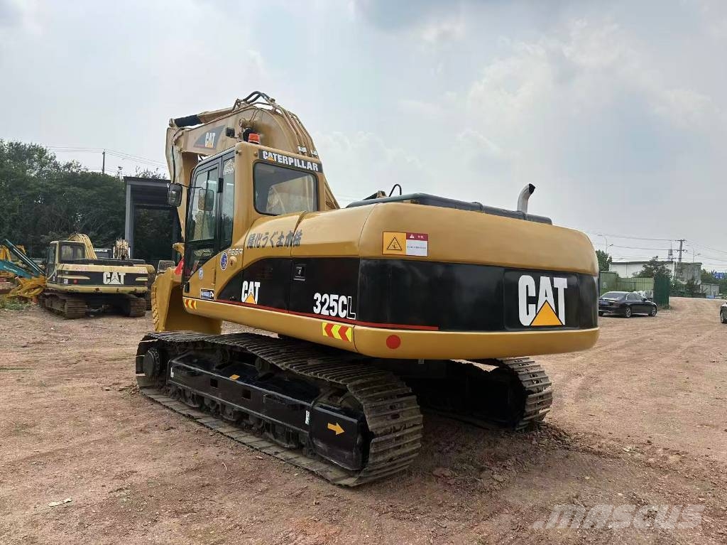 CAT 325 C Гусеничні екскаватори