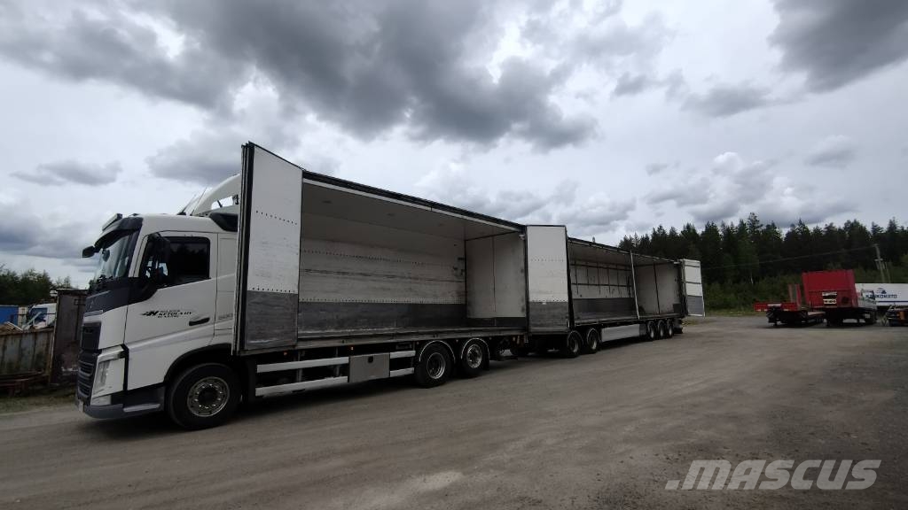 Volvo FH13 6x2 sivuauk+pl-nostin +5 aks kärry Camiones con caja de remolque
