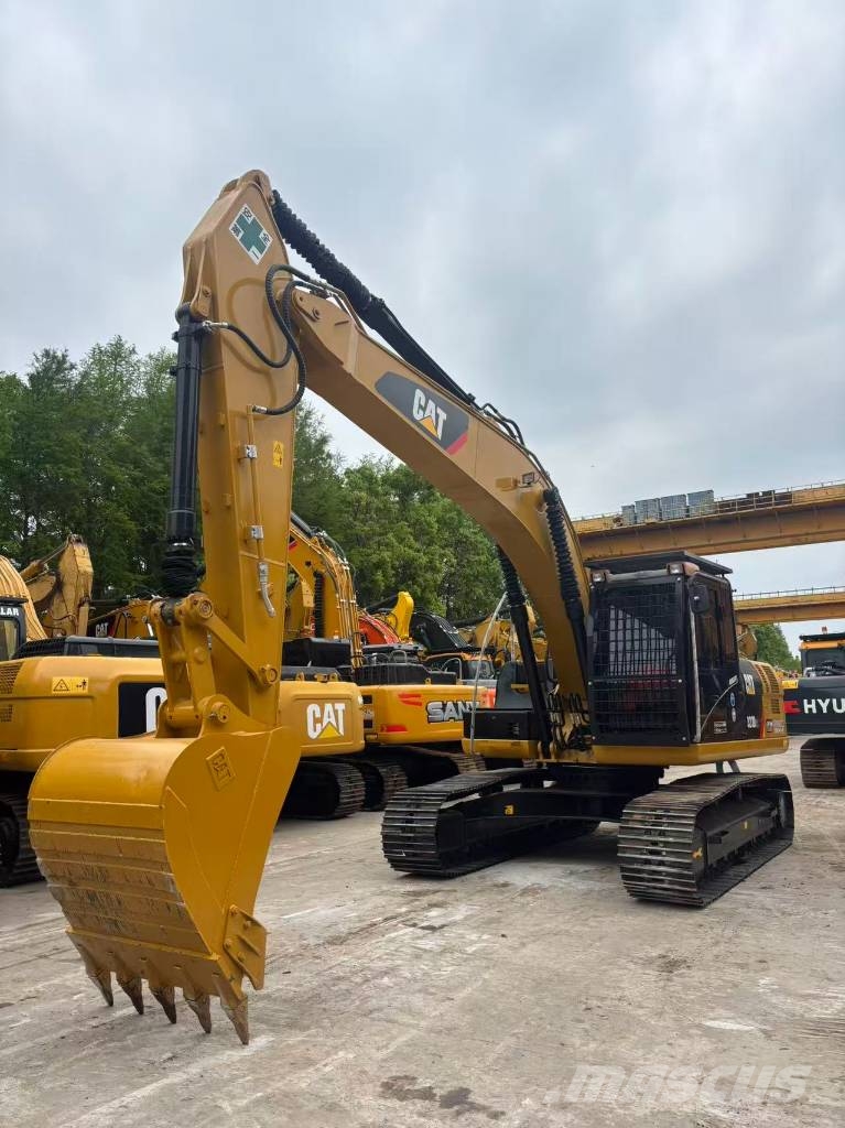 CAT 323 D Rupsgraafmachines