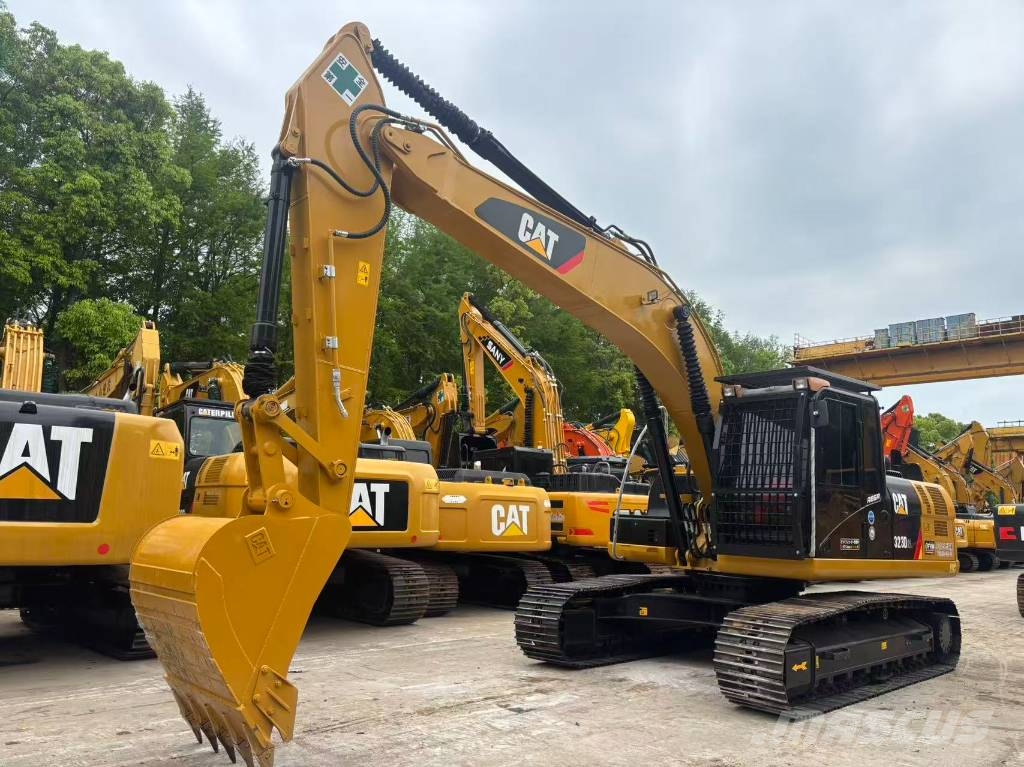 CAT 323 D Rupsgraafmachines