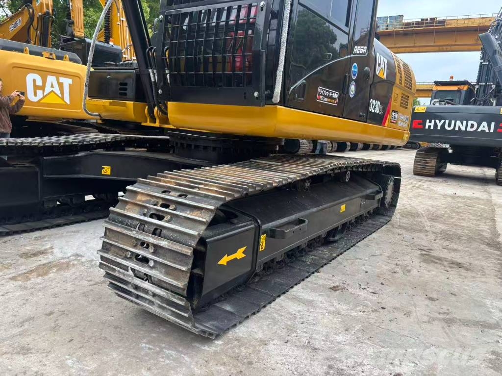 CAT 323 D Rupsgraafmachines