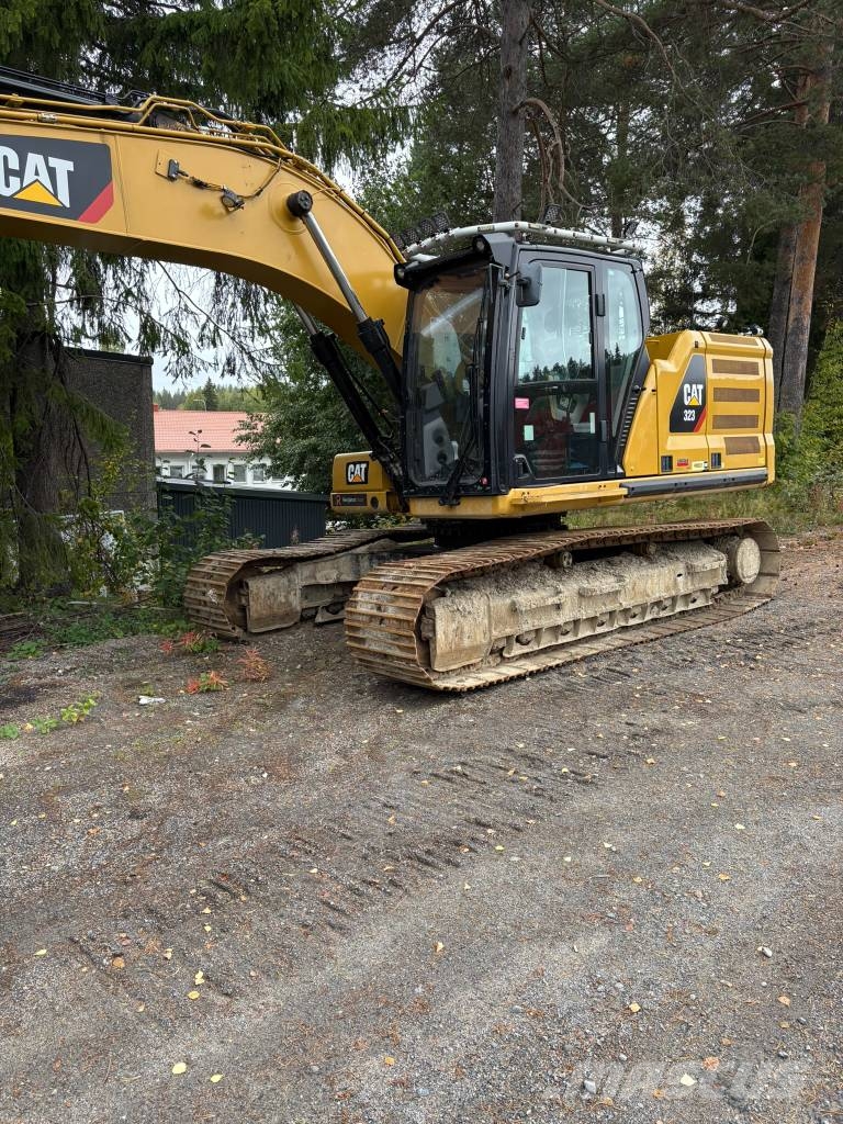 CAT 323 Kāpurķēžu ekskavatori
