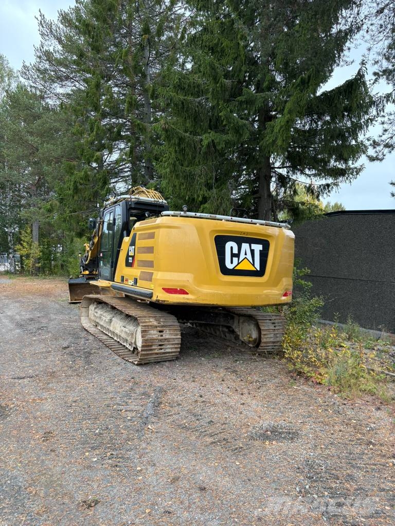 CAT 323 Kāpurķēžu ekskavatori