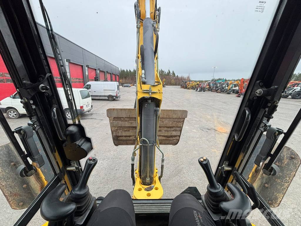 New Holland LB 115 B-4 PS/ Kallistaja, 2 kauhaa, Hyd-piikit Ekskavaatorlaadurid