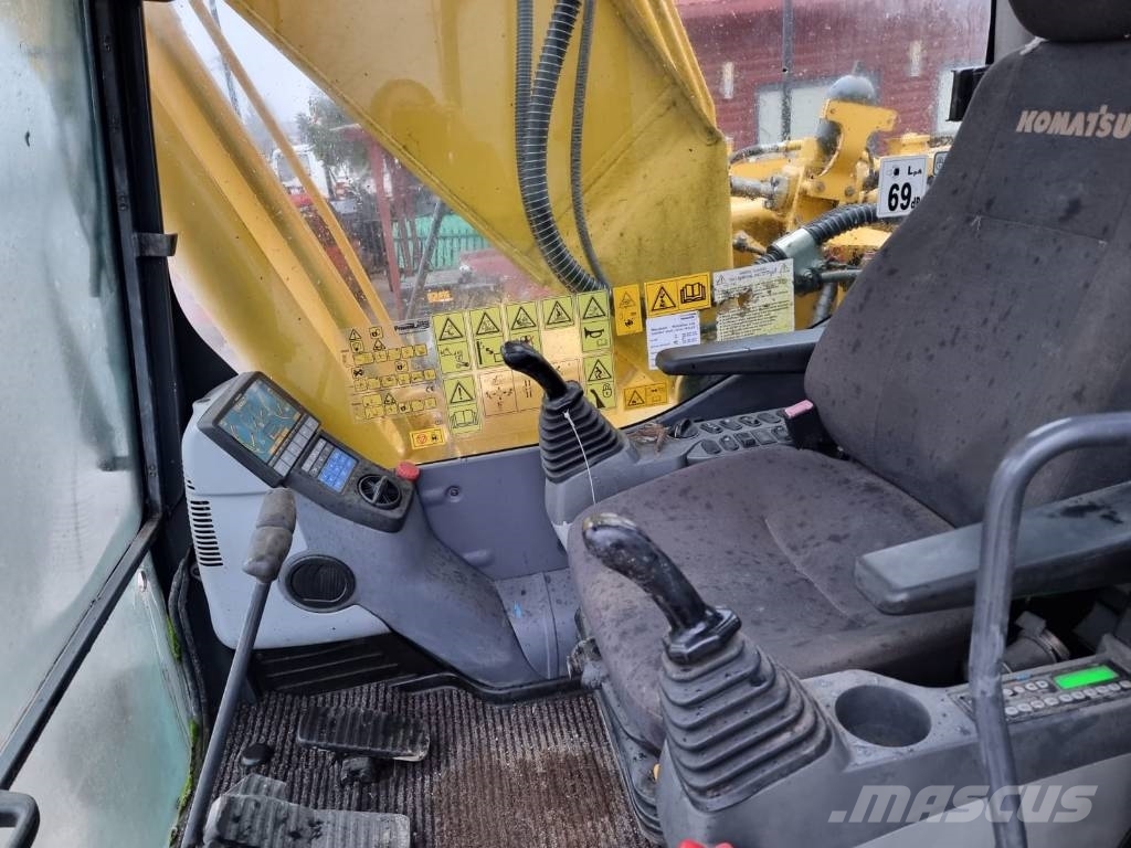 Komatsu HB 215 Hybrid حفارات زحافة