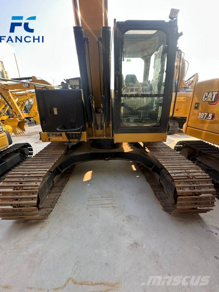 CAT 310 Pelle sur chenilles