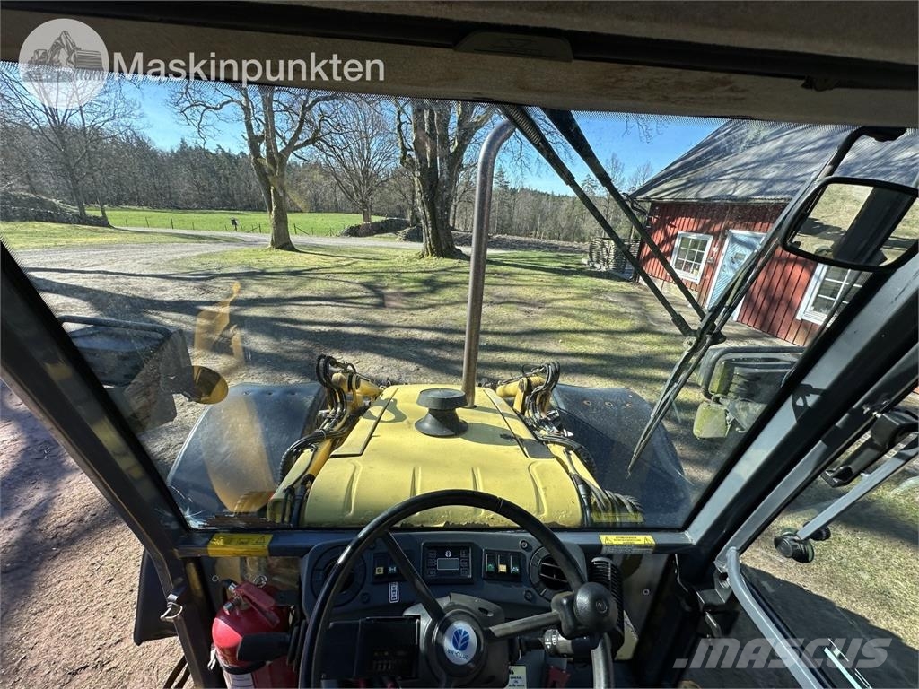 New Holland LB 115 Екскаватори-навантажувачі
