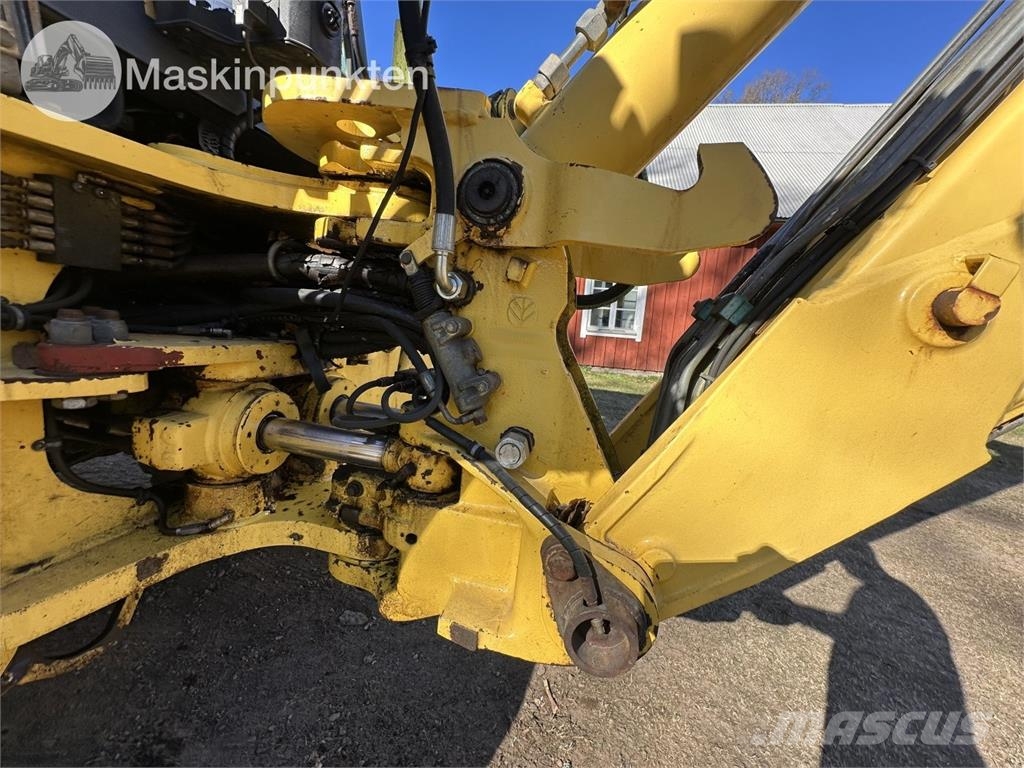 New Holland LB 115 Екскаватори-навантажувачі