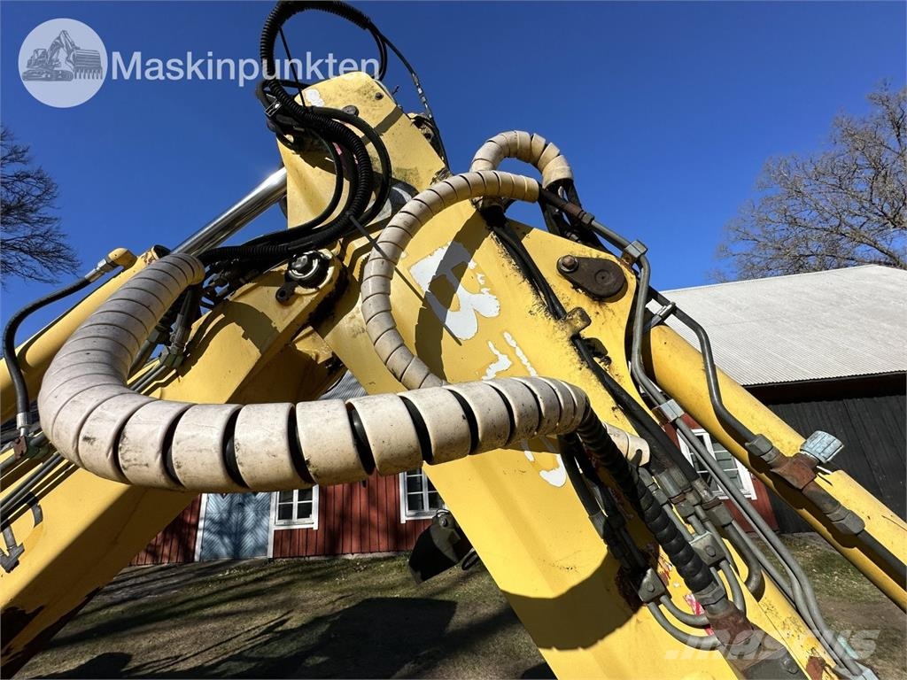 New Holland LB 115 Екскаватори-навантажувачі