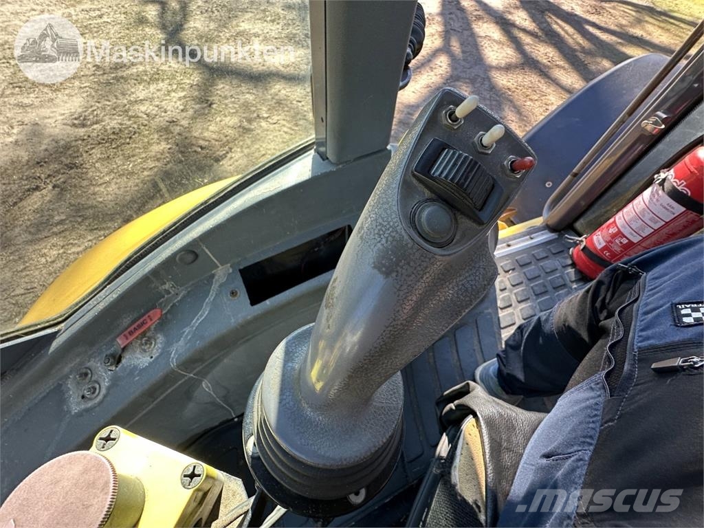 New Holland LB 115 Екскаватори-навантажувачі