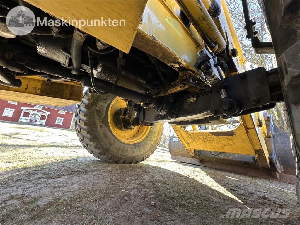 New Holland LB 115 Екскаватори-навантажувачі