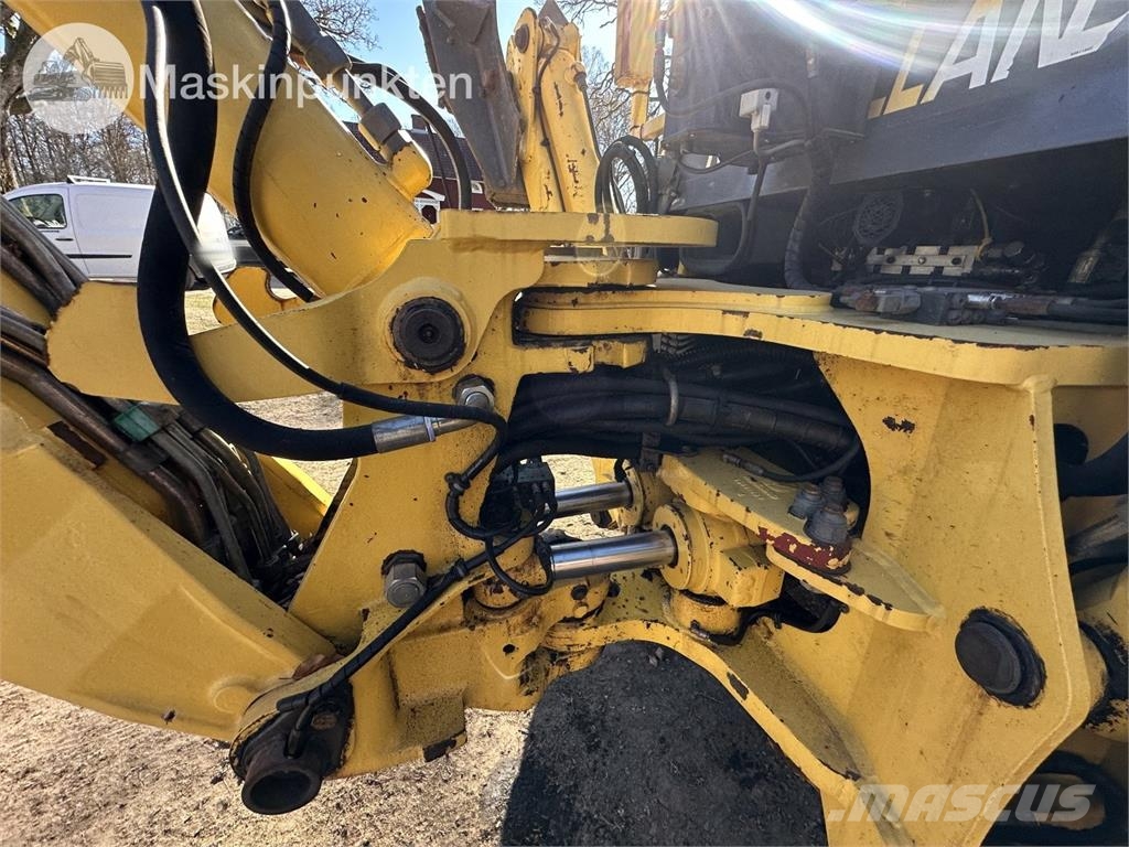 New Holland LB 115 Екскаватори-навантажувачі