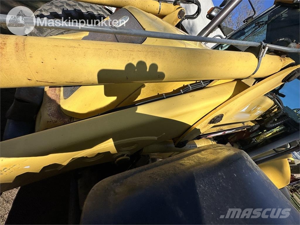 New Holland LB 115 Екскаватори-навантажувачі